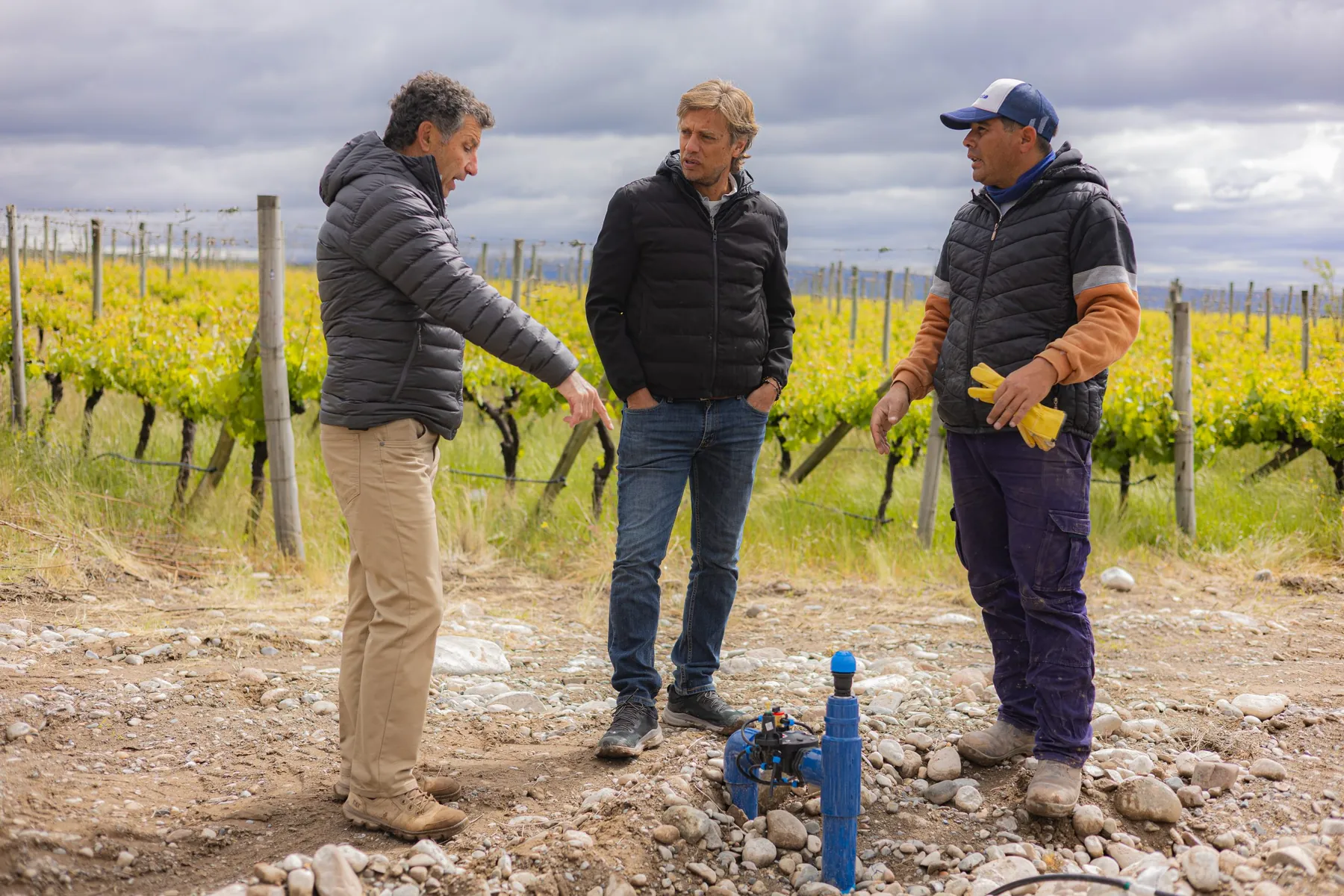 Francisco Evangelista with growers in a Mendoza vineyard